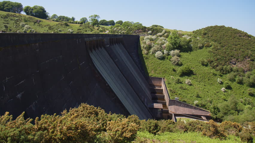Meldon Reservoir Dam with Sluice gates closed on sunny summer day, Dartmoor National Park