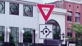 Yield sign in downtown Lansing, Michigan with stable video. - Powered by Shutterstock - Get 15% off with code: PIKWIZARD15