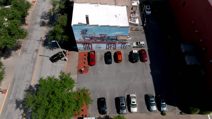 Downtown Rock Island, Illinois with drone video tilting up and moving forward.