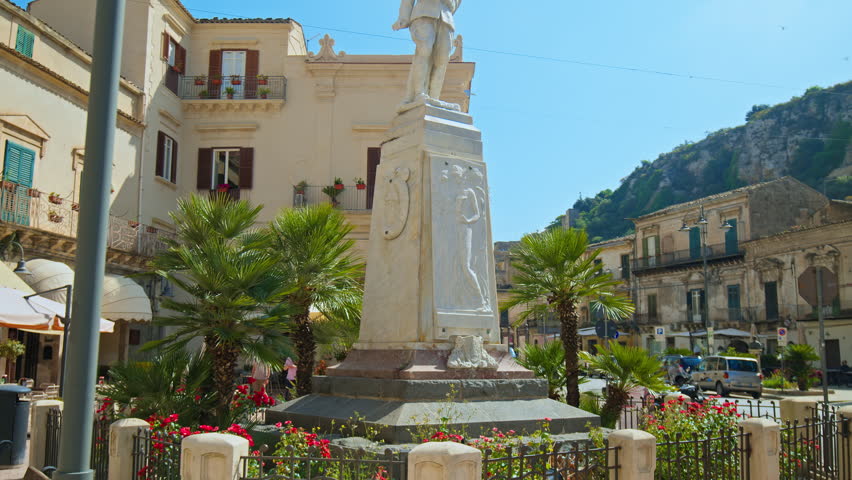 View of the Old historical sculpture in Modica, Sicily. Architectural statue in the center of Modica.
