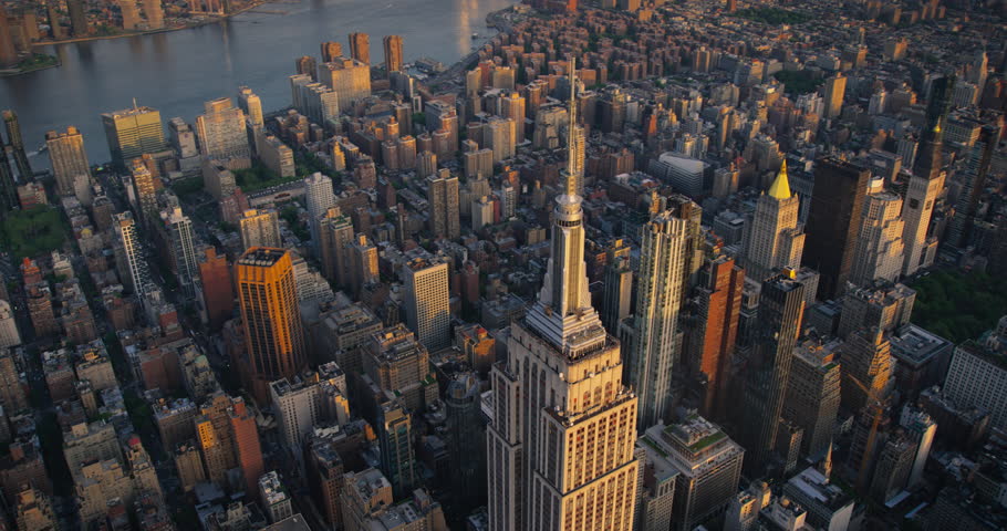 Panoramic Aerial Shot Around the Top of the Empire State Skyscraper in New York City. Helicopter View of the Spire, Viewing Platform with Tourists, Indoors Top Deck Observatory Royalty-Free Stock Footage #1106171241