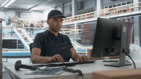 Multiethnic Male Manager Checking Inventory On Desktop Computer In Modern Warehouse Facility With Conveyor Belt. Sorting Center Employees Carrying Boxes To Package Goods And Deliver To Clients. - Powered by Shutterstock - Get 15% off with code: PIKWIZARD15