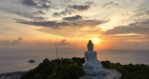 

aerial view around Phuket big Buddha in beautiful sunset.
360 degree view on Phuket big Buddha viewpoint.
Video clips for travel and religious ideas.
smooth cloud in stunning sky background
