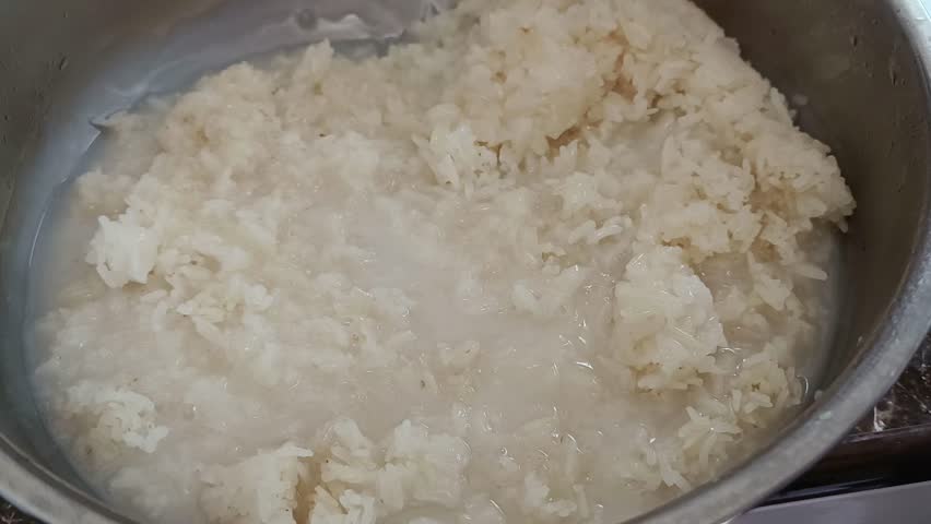 Cooking Sweet Coconut Milk for Mango Sticky Rice, Sweet Thai Desert Flavoring