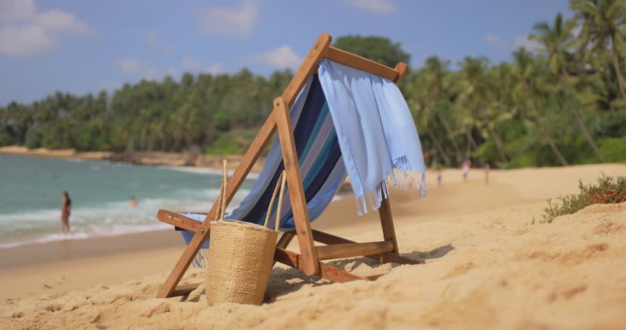 Amazing beach. Chairs on the sandy beach sea. Luxury summer holiday and vacation resort hotel for tourism. Inspirational tropical landscape. Royalty-Free Stock Footage #1106183749
