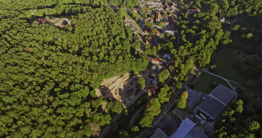 Helen Georgia Aerial v12 cinematic birds eye view drone flyover town center along the main street capturing dense forest mountainous landscape on a sunny day - Shot with Mavic 3 Cine - October 2022