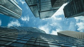 Time lapse of skyline commercial buildings and cloud sky. - Powered by Shutterstock - Get 15% off with code: PIKWIZARD15