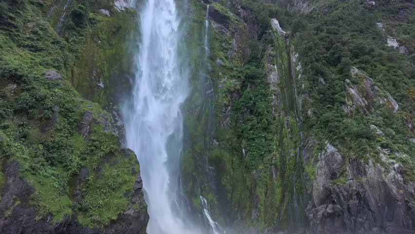 Waterfall in Milford Sound, Fiordland National Park, New Zealand Royalty-Free Stock Footage #1106198389
