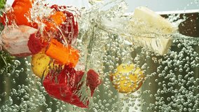 Super Slow Motion of Falling Vegetable and Beef Meat. Concept of Broth with Ingredients Falling Into Stainless Steel Pot with Boiling Water. Filmed on High Speed Cinema Camera, 1000 fps. - Powered by Shutterstock - Get 15% off with code: PIKWIZARD15