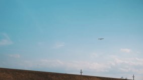military plane flies in the sky over the desert - Powered by Shutterstock - Get 15% off with code: PIKWIZARD15
