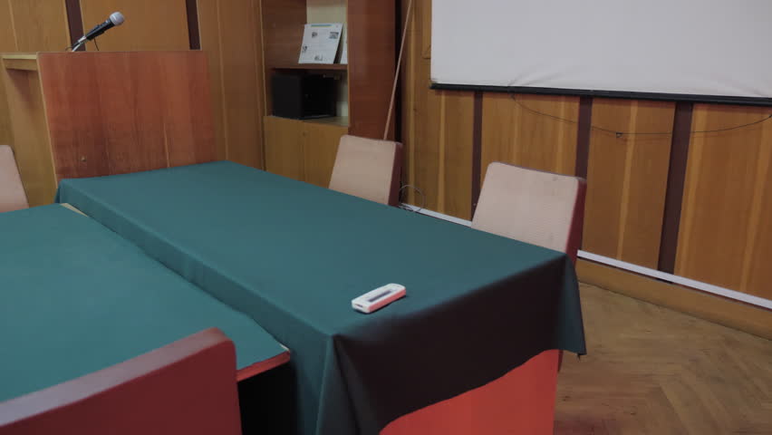 Empty Tribune With Microphone And Presidium Table In Conference Hall, Meeting Room, Boardroom, a Buildings & Landmark Video by StockVideo_Pro