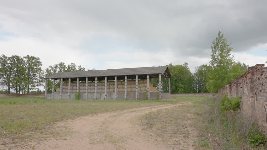 A big warehouse with lots of storage inside found on the side of the road in Estonia