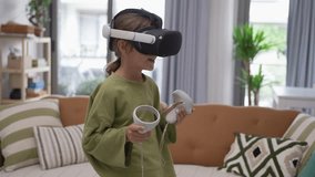 A Little Girl is Using a Virtual Reality Helmet