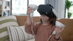 A Little Baby Girl is Using a Virtual Reality Helmet