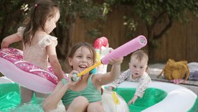  Group of Little Girls of Various Ages Play and Have Fun in a Pool - Powered by Shutterstock - Get 15% off with code: PIKWIZARD15