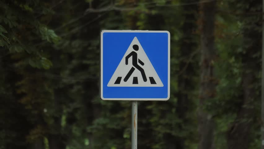 Crosswalk. Road sign. Signage of crosswalk. Road sign pedestrian crossing.