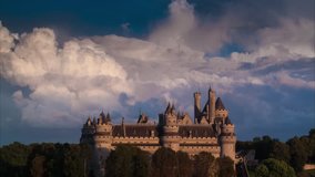 Dramatic storm clouds rolling over Pierrefonds castle towers as sunset changes to night. 4K UHD Timelapse. - Powered by Shutterstock - Get 15% off with code: PIKWIZARD15