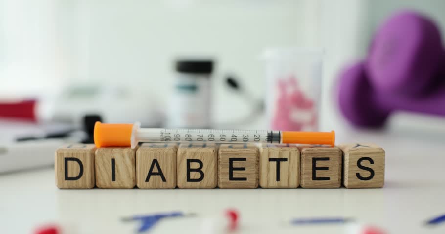 Word Diabetes of cubes with syringe on top on clinic table Royalty-Free Stock Footage #1106238701
