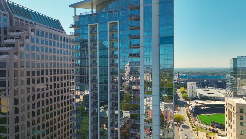 Aerial view of downtown district of Charlotte city in North Carolina, USA. Glass and steel high skyscraper buildings in modern american midtown