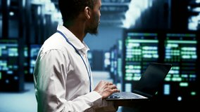 Technician inspecting cryptocurrency mining server clusters solving complex mathematical equations. Specialist in high tech facility housing blockchain technology high volume real time transactions - Powered by Shutterstock - Get 15% off with code: PIKWIZARD15