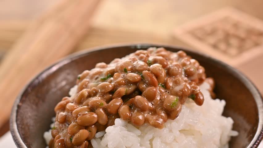 Natto made from traditional Japanese soybeans Royalty-Free Stock Footage #1106253771