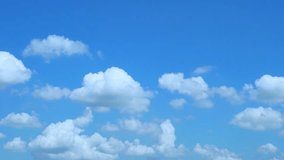 Soaring Puffy White Clouds and Blue Clear Sky on a Sunny Clear Day, Slow Motion, Time Lapse. Summer Cloudy Blue Skyscraper, Atmosphere, Environment, Good Weather, Beautiful Background 4K. - Powered by Shutterstock - Get 15% off with code: PIKWIZARD15