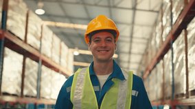 Happy professional worker looking at camera and smiling in the background warehouse with shelves full of delivery goods. Logistics, Delivery, and Distribution center. - Powered by Shutterstock - Get 15% off with code: PIKWIZARD15