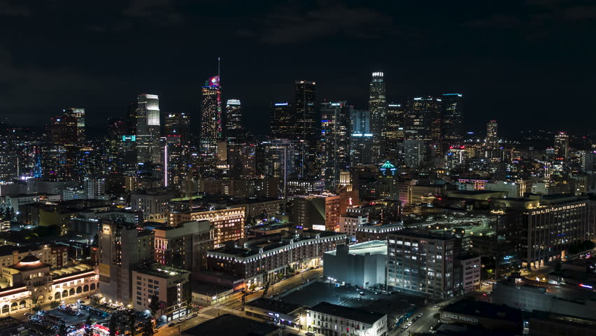 Establishing Aerial View Shot of Los Angeles CA, L.A. California US, perfect clear shot, track in push in, wide view of DTLA, Downtown LA at night evening