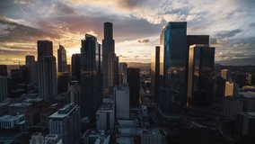 Establishing Aerial View Shot of Los Angeles CA, L.A. California US, Fabulous Sunset, sun rays and flares, Downtown LA, Los Angeles Skyline, circling left