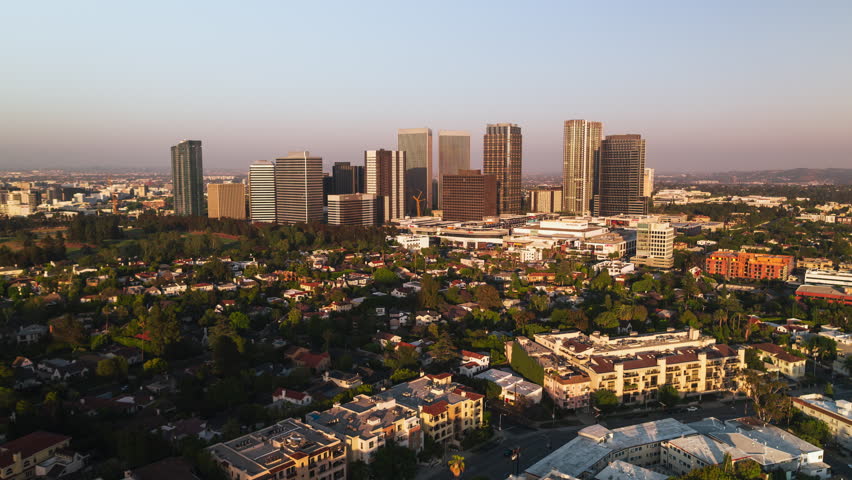 Establishing Aerial View Shot of Los Angeles LA CA, L.A. California US, Century City, superb view, sunset, circling left Royalty-Free Stock Footage #1106272155