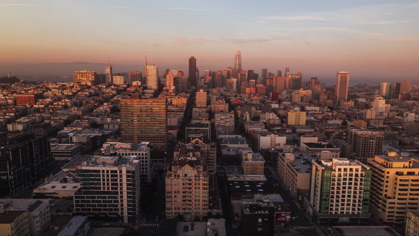 Establishing Aerial View Shot of San Francisco CA, California, United States, America, magical sunset, red and orange, tracking in push in, whole city, San Francisco Skyline Royalty-Free Stock Footage #1106275245