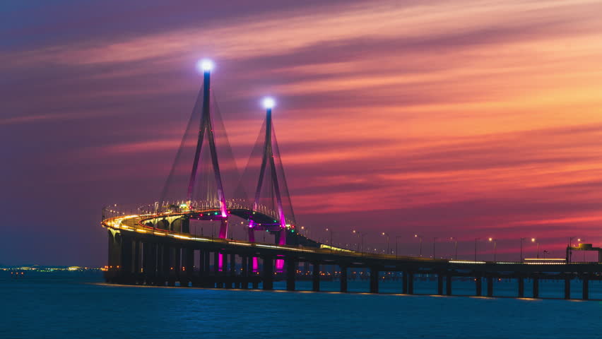 Sunset and night view of Incheon Bridge on the sea against sea horizon in summer Royalty-Free Stock Footage #1106276641