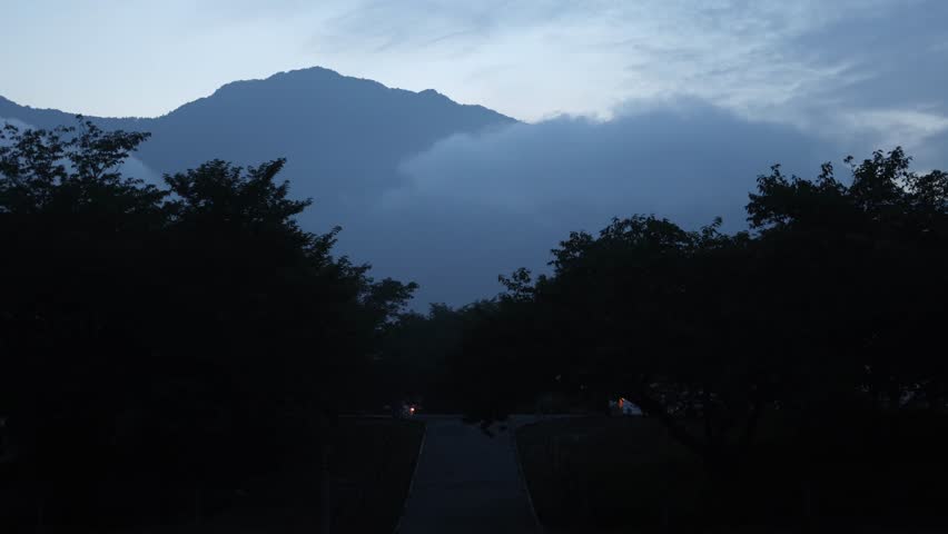 Evening view of mountains at dusk with clouds. Taken at Asagiri Highlands in summer.