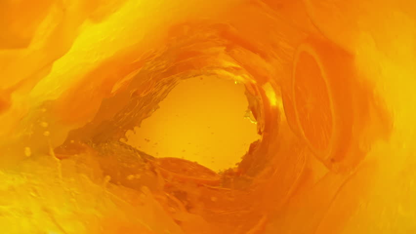 Super slow motion of mixing orange juice in twister shape. Filmed on high speed cinema camera, 1000 fps. Royalty-Free Stock Footage #1106282603