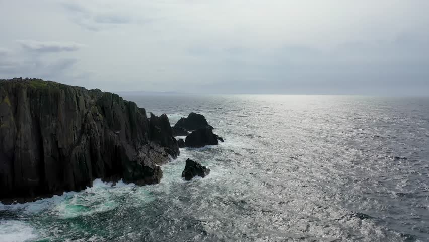 Aerial view of the coastline at Malin Head in Ireland. Royalty-Free Stock Footage #1106284441