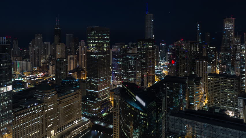 Chicago, Illinois, USA - June 30th 2020 - Beautiful Chicago Skyline and Lake Michigan Aerial Sunrise Timelapse