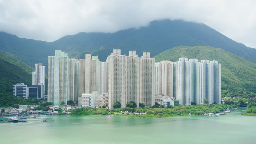 Aerial view Cityscape skyline with skyscrapers building at downtown district and seascape of vitoria bay at Hong Kong, China. Landmark famous place and tourism concept.