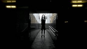 40s man wearing sportswear running outdoor. Portraits of caucasian man stretching arm before running under the building. Training athlete work out at outdoor concept. - Powered by Shutterstock - Get 15% off with code: PIKWIZARD15