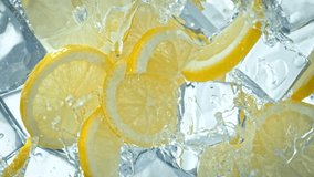 Super Slow Motion Shot of Water Wave Splashing on Lemon Slices and Ice Cubes at 1000fps. - Powered by Shutterstock - Get 15% off with code: PIKWIZARD15