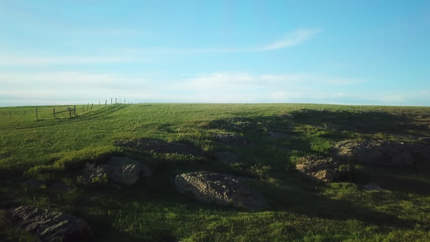 Aerial Backward Shot Of Van On Idyllic Green Meadow Against Sky, Drone Flying Over Land - Billings, Montana