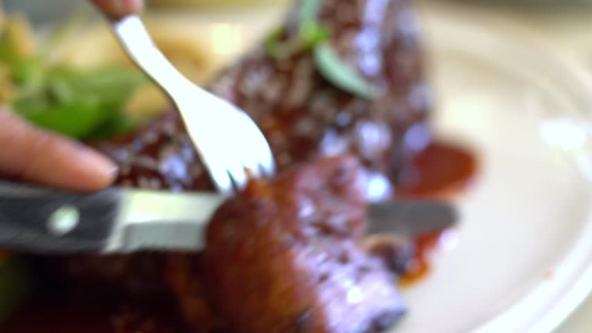 Close up Pepper beef steak served with sausage, French fries and fresh salad. Selective focus. Shooting in studio, Clean food good taste idea concept.