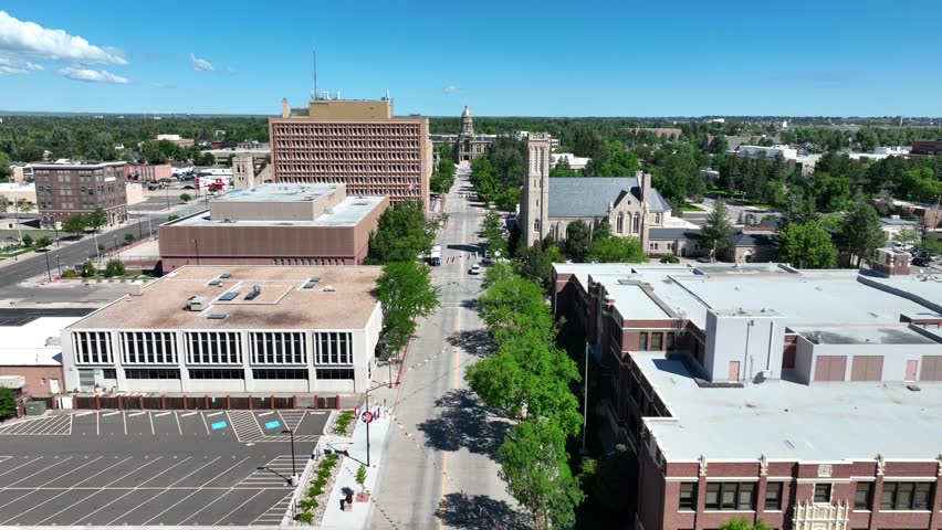 Aerial shot of main street in Cheyenne, the capital of Wyoming. Aerial shot of Capitol building from distance.