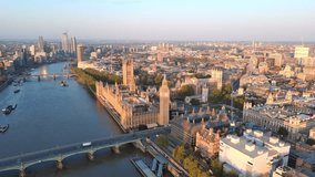 Aerial View of London, UK: Iconic Clock Tower, Big Ben and Palace of Westminster in Center of Capital City of Great Britain and Northern Ireland at Sunrise - Powered by Shutterstock - Get 15% off with code: PIKWIZARD15