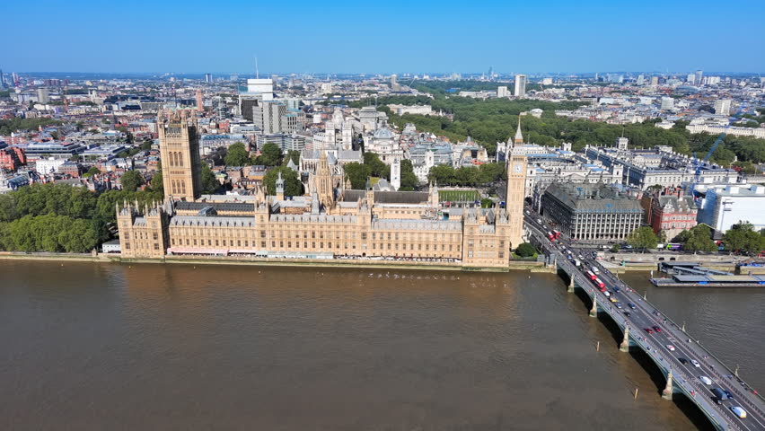 Aerial View of London, UK: Iconic Clock Tower, Big Ben and Palace of Westminster in Center of Capital City of Great Britain and Northern Ireland Royalty-Free Stock Footage #1106341247
