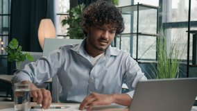 Upset anxious businessman Arabian Indian man working at office write graphics business paperwork no ideas crisis mistake wrong papers difficult work burnout failure crumpling sheet of paper throw away - Powered by Shutterstock - Get 15% off with code: PIKWIZARD15