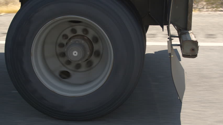 18 Wheeler Truck Wheels Riding Down Highway Royalty-Free Stock Footage #1106349903