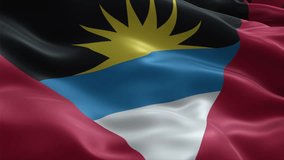 Antigua and Barbuda flag video waving in wind. Realistic flag background. Close up view, perfect loop, 4K footage