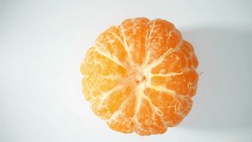 Orange without peel: A vibrant, succulent fruit, the orange's juicy flesh bursts with tangy sweetness. Its intricately segmented texture and vibrant hues captivate. Fruit concept. Orange background
