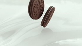 Sandwich Cookies Falling into Creamy Milk Making Swirly Splashes in Macro and Slow Motion 1000 fps - Powered by Shutterstock - Get 15% off with code: PIKWIZARD15