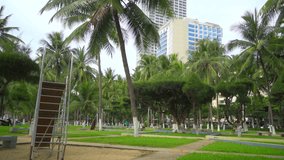 Central city Park near the sea.  Early morning. Panoramic video shooting with the sound of the city. The resort town of Nha Trang in Vietnam.